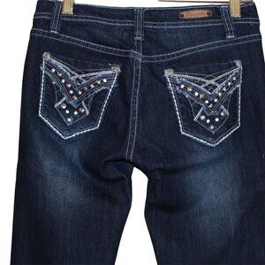 Puzzle Womens jeans skinny dark wash low rise blue stud detail on pockets 1/2